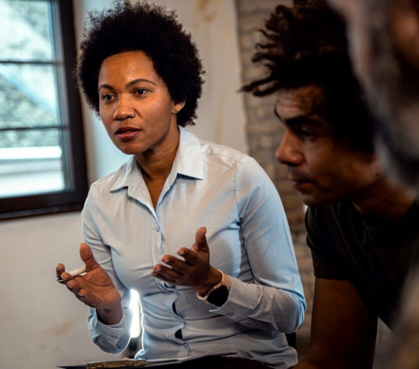 A professional explaining what you can expect with intervention services